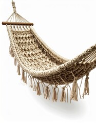 Obraz premium Handwoven macrame hammock in neutral beige tones with tasseled edges isolated on white