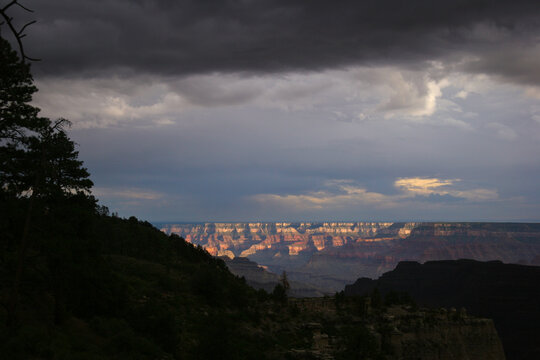 Sunset below impending storm clouds