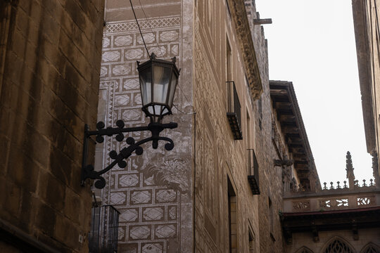 low angle looking up at gothic architecture in Barcelona, Spain