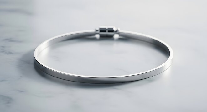 Minimalist anklet with magnetic closure and sleek silver finish for elegant accessory photography
