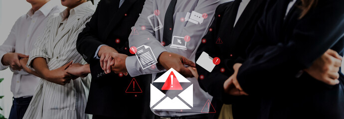 A group of professionals engaged in a discussion about email alerts and notifications. Digital icons highlight communication, emphasizing information security in a modern office. Gantry © InfiniteFlow