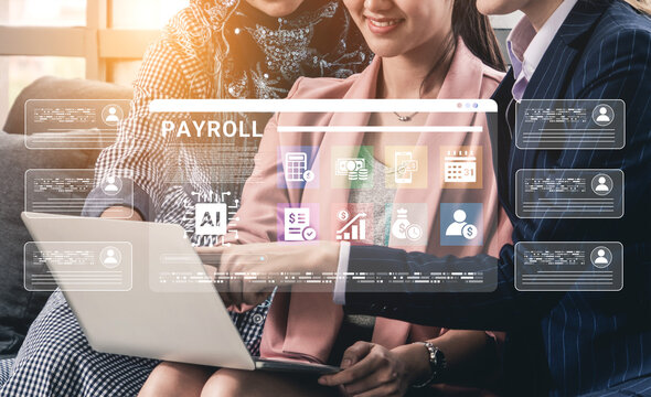 Professionals engage with payroll software while collaborating in a modern office. They utilize technology to improve workflow and enhance business efficiency. Cyphers