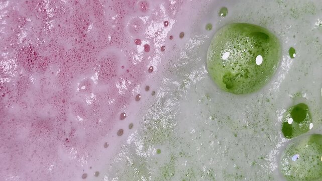 Bath bomb bubbles multiply and expand creating surreal graphic element