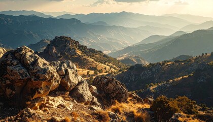 Fototapeta premium Foreground Rocks, Midground Hills, Background Mountains – Layered Depth Landscape