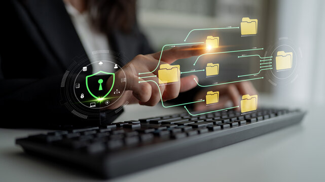 Secure Data Management Concept with Digital Lock Symbol Overlaid on Keyboard Demonstrating Cybersecurity and Information Technology Practices Fluxor.