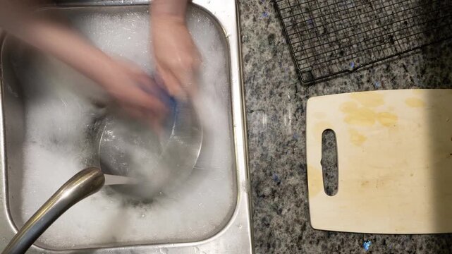 Top-Down Timelapse of Washing Dishes in Kitchen Sink