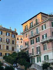 Obraz premium Historic colorful buildings in Rome, Italy with warm sunset light 