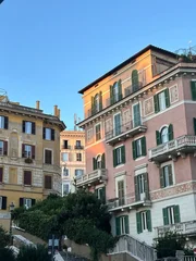 Fototapeten Mediterranes Europa Historic colorful buildings in Rome, Italy with warm sunset light   © Irina