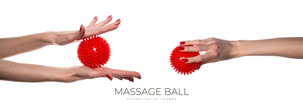 Massage red ball in female hand for trigger points isolated on a white background. Concept of myofascial release.