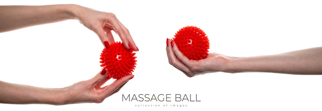 Massage red ball in female hand for trigger points isolated on a white background. Concept of myofascial release.