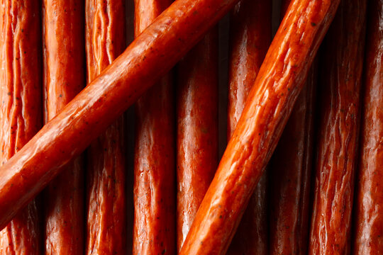 A top down view of a pile of chicken sticks, as a background.