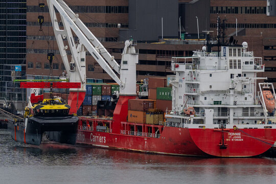 St. John's, Newfoundland, Canada-May 10, 2026: MV Ronnie, dship Carriers, moored in St. John's harbour, Newfoundland, offloading two new workboats to support the aquaculture industry of salmon farming