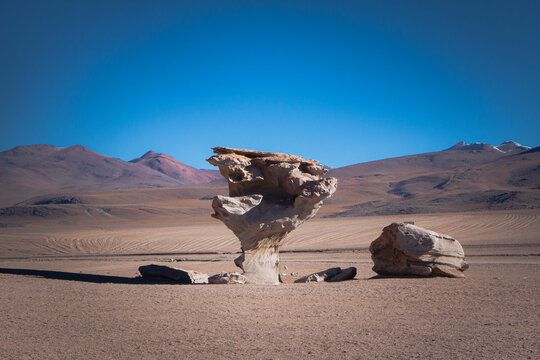 The Arbol de Piedra rock formation in the Siloli Desert under a dramatic sky, Bolivia.
