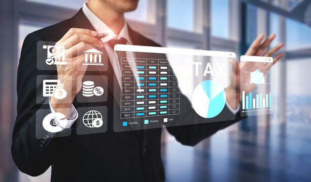 A business professional engages with interactive financial data using touchscreen technology in a contemporary office space, showcasing modern analytical tools for effective decision-making. Ledger