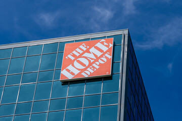Naklejka premium North York, Ontario, Canada - April 26, 2026: Close up of The Home Depot logo sign on their Canadian headquarters building in North York, Ontario, Canada. Home Depot is an American multinational home 