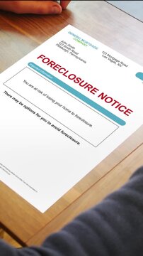 A Stressed Homeowner Looks at Generic Foreclosure Notice - Vertical