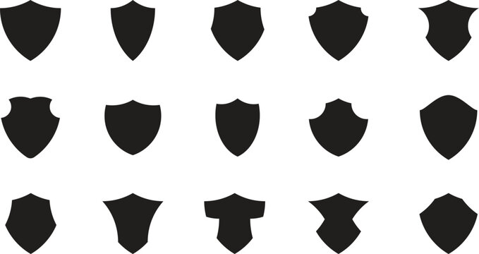 Shield badge silhouettes set with various crest shapes for logos, emblems, and protection symbols. Minimal black icons ideal for branding, security concepts, gaming, and heraldic designs. Clean vector