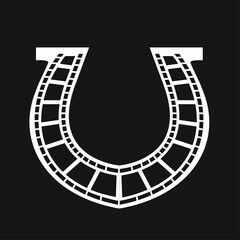 Fototapeta premium Film Strip Horseshoe Icon on Black Background - Cinema Luck Symbol