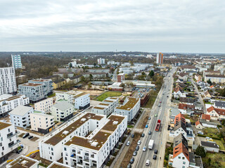 Fototapeta premium Drone aerial of modern housing development Hellwinkel-Terrassen in Wolfsburg-Stadtmitte, Germany