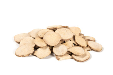 Obraz premium Dried white peony root slices pile on white background