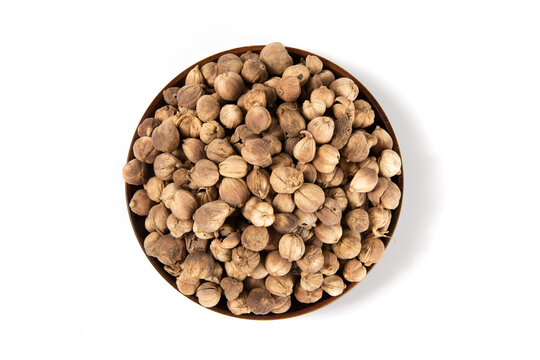 Amomi fructus white cardamom spice seeds in bowl