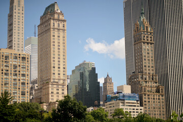 Skyline Composed Of Historic Towers And Modern Glass Structures Illuminated At Midday new york © aletia2011