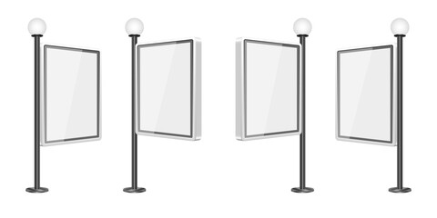 Four blank advertisement posters on metal stands with globe lights on top. © Sky