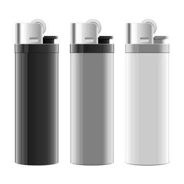 Lighters: Black, Gray, and White Fuel Ignition Devices in a Row. Close Up.