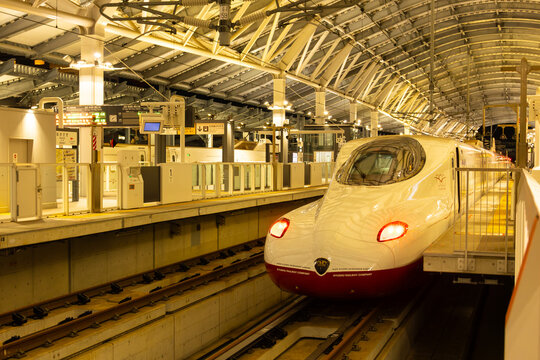 Nov 24th, 2025 - Nagasaki, Japan - Kyushu Shinkansen train at station platform at night