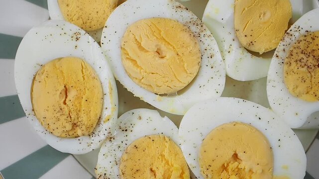 Cooking hard boiled eggs and seasoning them for taste