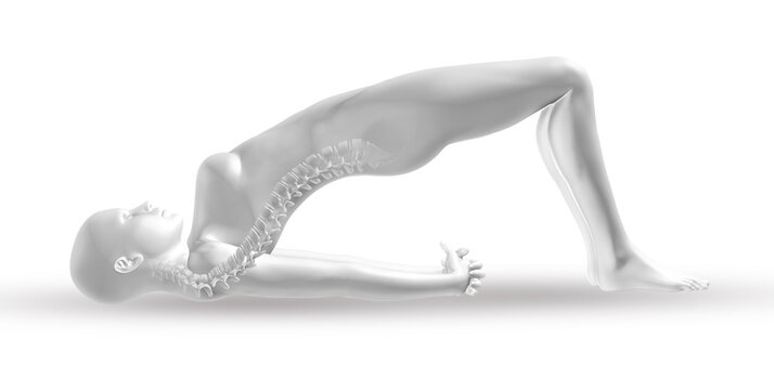 Woman performing urdhva dhanurasana wheel pose yoga asana in a studio setting