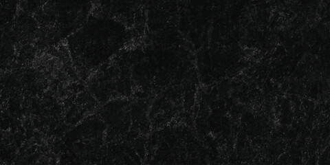 Dark charcoal grunge wall texture background. Dark black rough grunge surface with smoke edge. Black texture chalk board and black board. © MDFAIMIDULISLAM
