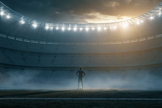 Athlete standing alone in huge illuminated stadium before competition, ideal for sports motivation and championship themed projects.