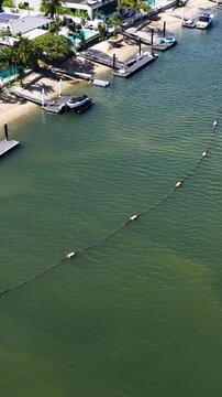 Aerial View of Luxury Waterfront Homes and Sand Bypass Pipe in Gold Coast