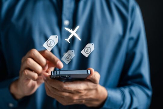 Flight ticket booking and travel price comparison solution. Man using smartphone to buy cheap airplane tickets online.