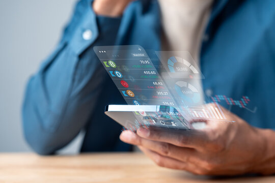Investor analyzing stock market data for portfolio management. Futuristic smartphone app showing virtual financial figures, asset allocation pie charts, and business growth strategy.