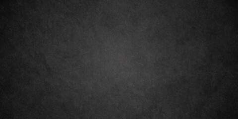Dark charcoal grunge wall texture background. Dark black rough grunge surface with smoke edge. Black texture chalk board and black board. © MDFAIMIDULISLAM