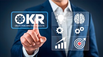Obraz premium Business professional interacting with a digital interface displaying OKR - Objective and Key Results, goal setting, and performance metrics