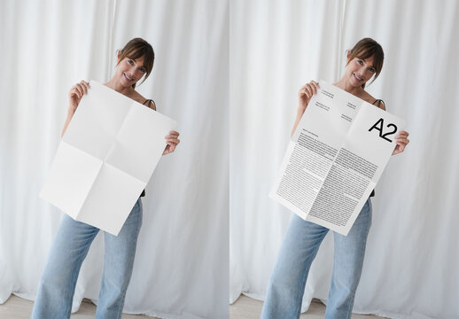 Mockup Of Woman Holding Customizable A2 Poster