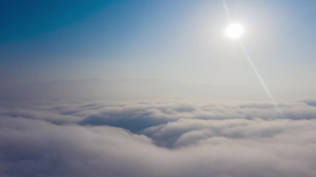 Aerial Flight Through Rolling Mountain Mist and Dramatic Sea of Clouds in Highland Terrain