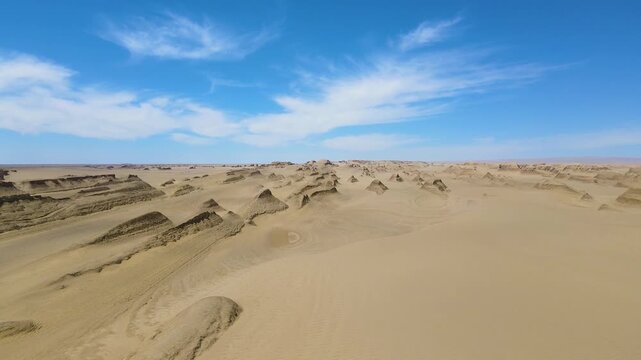 Dramatic Yardang Desert Landforms Captured From the Air at Golden Hour