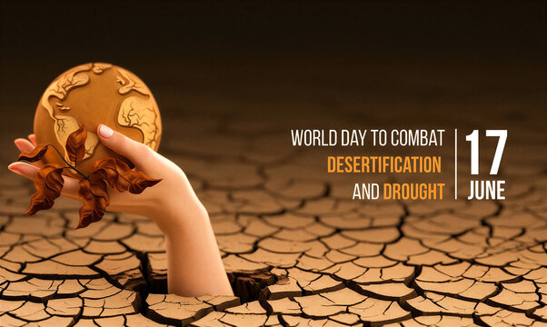Conceptual image of hand holding cracked earth and globe for desertification awareness campaign on dry land