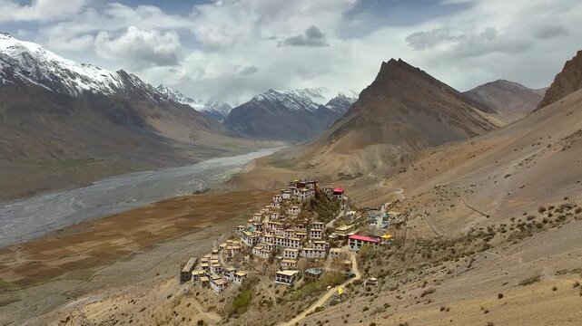 Key Monastery on mountain cliff, Spiti Valley drone photography
Spiti Valley aerial view with Key Monastery and snow mountains
Buddhist monastery in Himalayas, Key Monastery drone landscape India
Scen