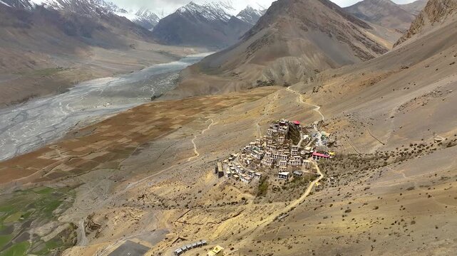 Key Monastery on mountain cliff, Spiti Valley drone photography
Spiti Valley aerial view with Key Monastery and snow mountains
Buddhist monastery in Himalayas, Key Monastery drone landscape India
Scen