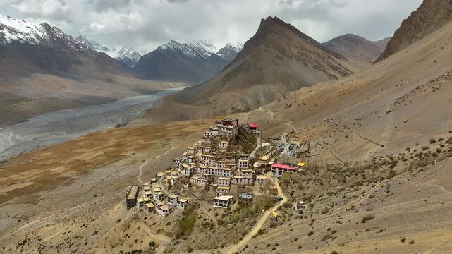 Key Monastery on mountain cliff, Spiti Valley drone photography
Spiti Valley aerial view with Key Monastery and snow mountains
Buddhist monastery in Himalayas, Key Monastery drone landscape India
Scen