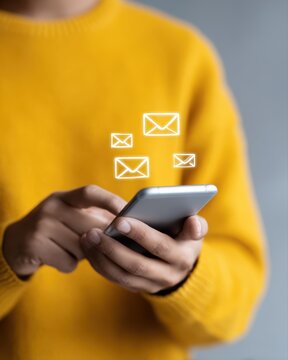 Person checking email inbox on smartphone with notification icons