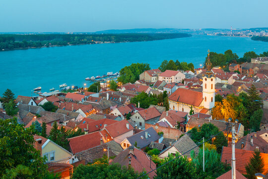 Panoramic view of the historic Zemun district of Belgrade from Gardos Hill, overlooking the Danube River, with the illuminated St. Nicholas Orthodox Church, Belgrade, Serbia