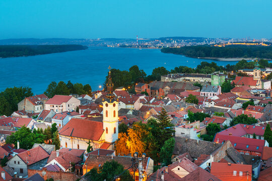 Panoramic view of the historic Zemun district of Belgrade from Gardos Hill, overlooking the Danube River, with the illuminated St. Nicholas Orthodox Church, Belgrade, Serbia