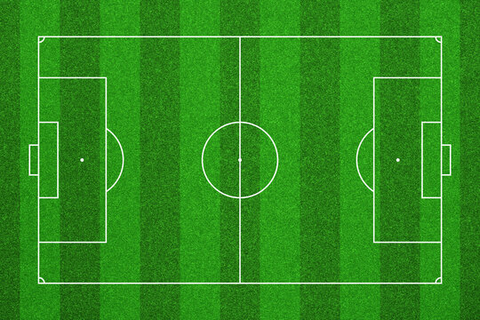 Top-down view of a green soccer pitch with standard white markings. Ideal for sports strategy or as a graphic background.