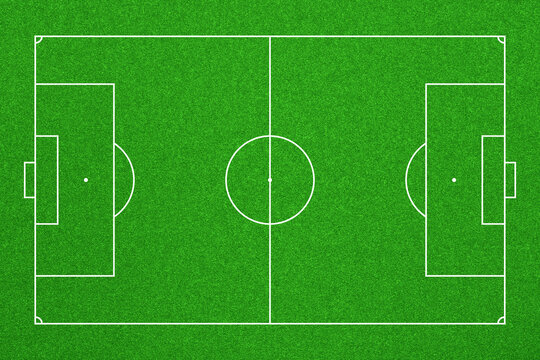 Top-down view of a green soccer pitch with standard white markings. Ideal for sports strategy or as a graphic background.